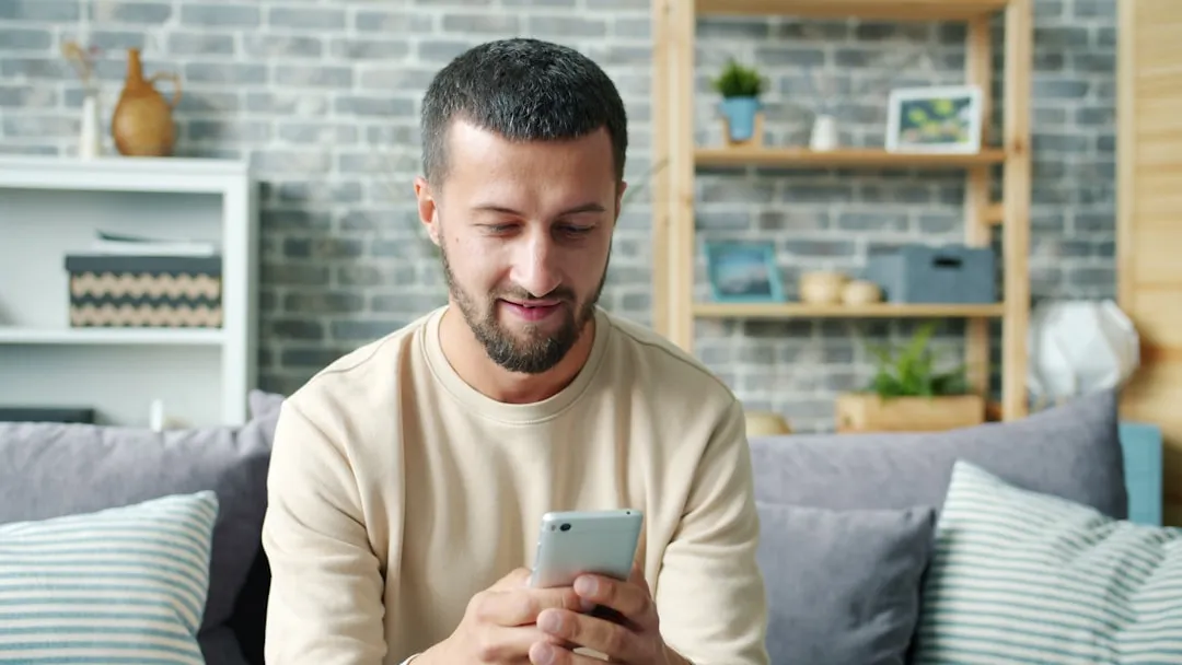 homeowner comfortably using a smart home interface during a blackout - generator installation benefits for california homeowner comfortably using a smart home interface during a blackout - generator installation benefits for california